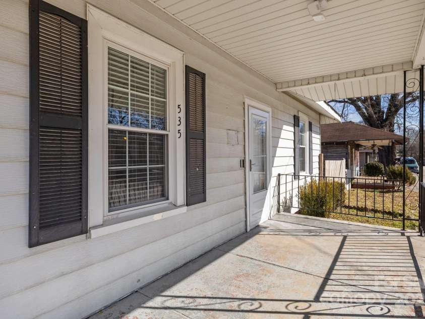 535 5th Street, Chester, SC 29706.  MLS# CAR4297832, YatesRealty ID 14960. Rocking chair front porch