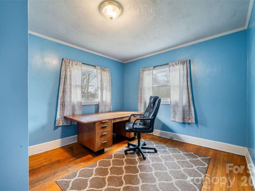 298 School Road, Asheville, NC 28803.  MLS# CAR4329443, YatesRealty ID 14967. Front bedroom