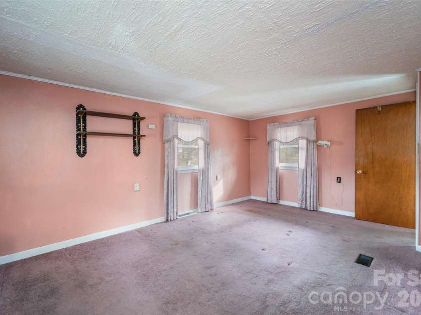 298 School Road, Asheville, NC 28803.  MLS# CAR4329443, YatesRealty ID 14967. Primary bedroom
