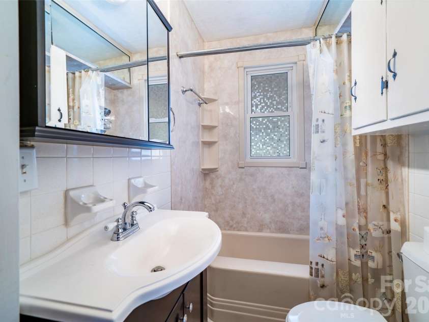 298 School Road, Asheville, NC 28803.  MLS# CAR4329443, YatesRealty ID 14967. Second bathroom