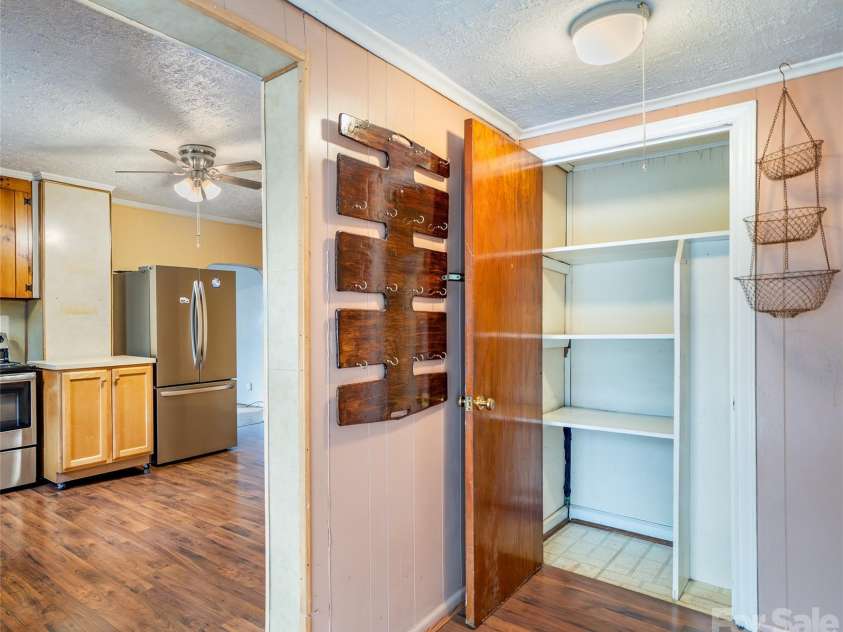 298 School Road, Asheville, NC 28803.  MLS# CAR4329443, YatesRealty ID 14967. Side entry hallway 