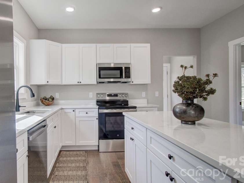 147 Northbend Drive, Asheville, NC 28804.  MLS# CAR4353715, YatesRealty ID 14968. Virtually Staged