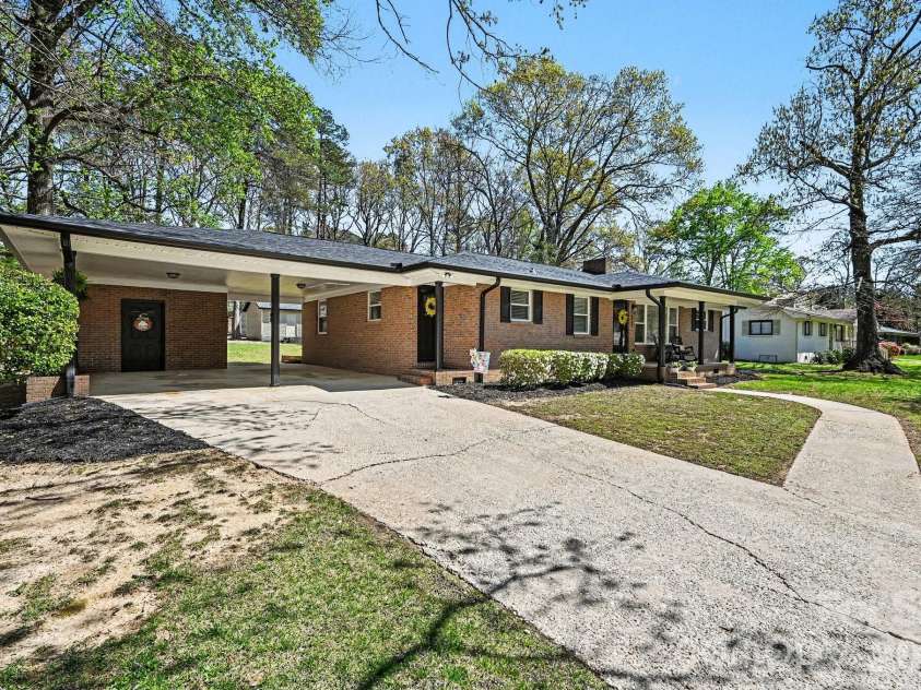 235 Cantiberry Drive, Salisbury, NC 28146.  MLS# CAR4363574, YatesRealty ID 14970. Left corner view near street. 