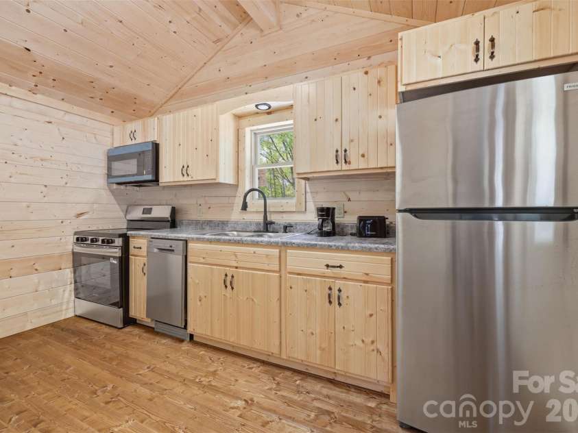 387 Tree Top Circle, Fleetwood, NC 28626.  MLS# CAR4370582, YatesRealty ID 14972. 