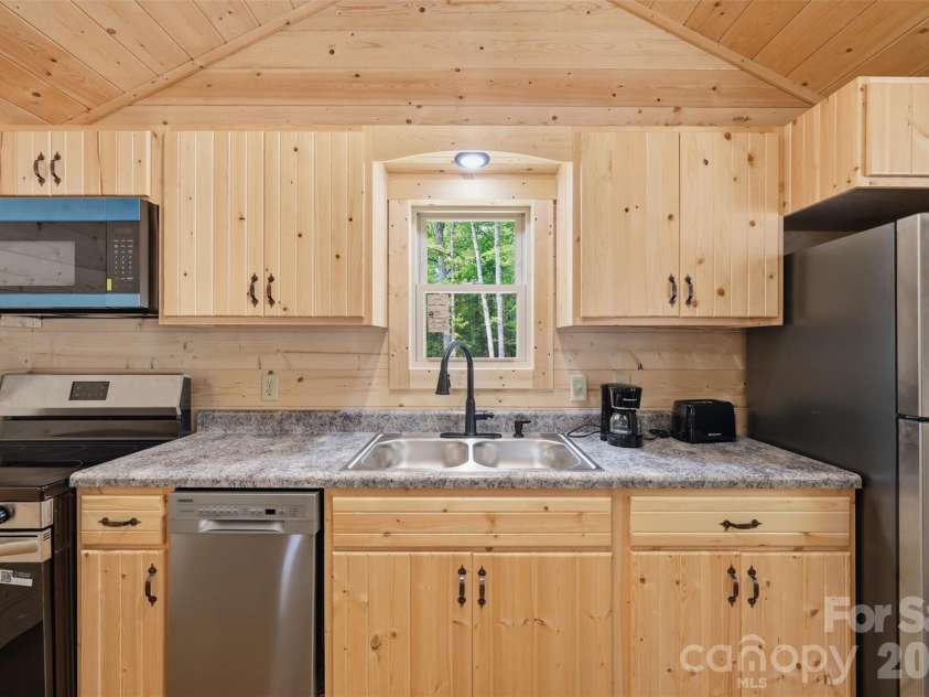 387 Tree Top Circle, Fleetwood, NC 28626.  MLS# CAR4370582, YatesRealty ID 14972. 