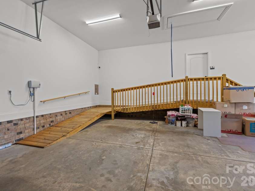 13249 Belle Grove Manor Lane, Matthews, NC 28105.  MLS# CAR4362893, YatesRealty ID 14975. Garage Ramp