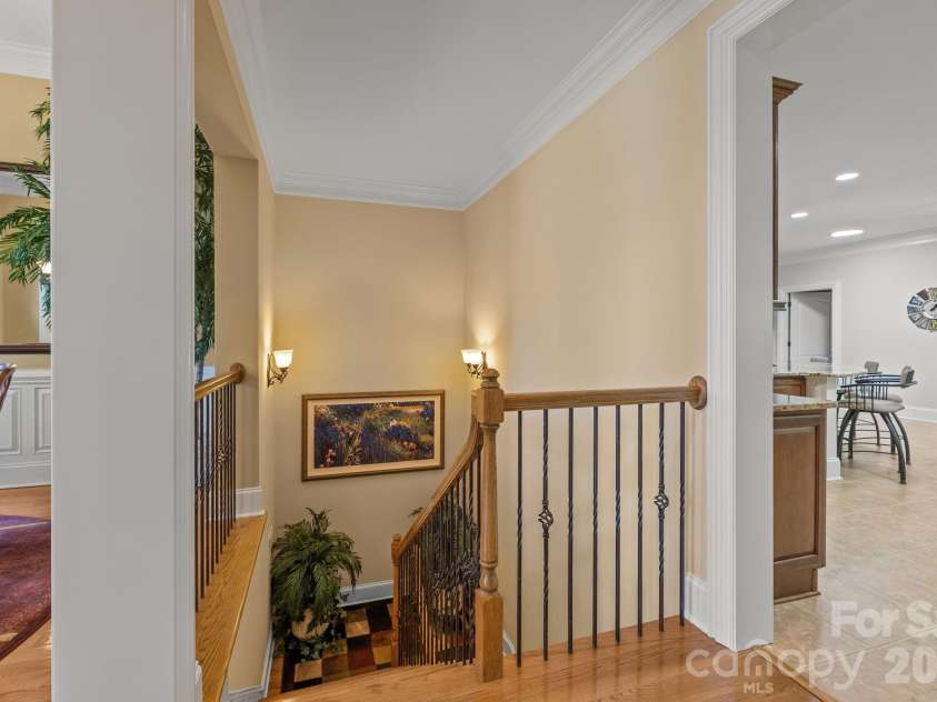13249 Belle Grove Manor Lane, Matthews, NC 28105.  MLS# CAR4362893, YatesRealty ID 14975. Stairs to basement level