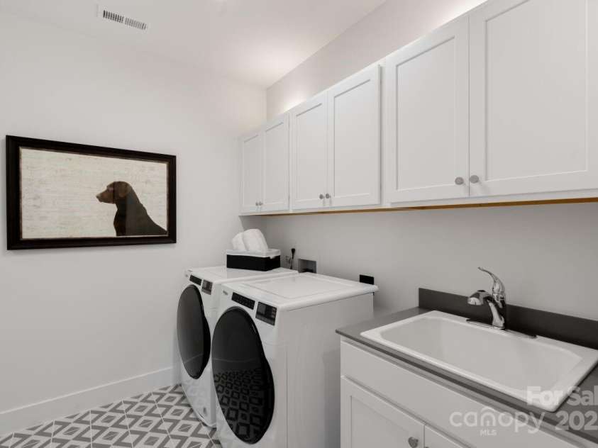 2529 Mabel Lane, Monroe, NC 28110.  MLS# CAR4263621, YatesRealty ID 14976. Digital Image Similar--Upper Level Laundry
