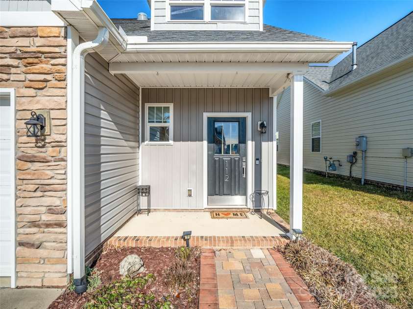 112 Pamlico Road, Fletcher, NC 28732.  MLS# CAR4215521, YatesRealty ID 14982. Cute front porch and entry!