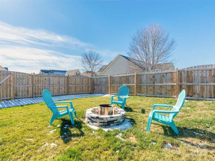 112 Pamlico Road, Fletcher, NC 28732.  MLS# CAR4215521, YatesRealty ID 14982. Firepit area.