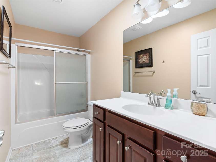 112 Pamlico Road, Fletcher, NC 28732.  MLS# CAR4215521, YatesRealty ID 14982. Full bathroom upstairs with solar tube skylight.