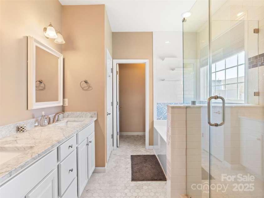 112 Pamlico Road, Fletcher, NC 28732.  MLS# CAR4215521, YatesRealty ID 14982. Gorgeous primary bathroom with double vanity.
