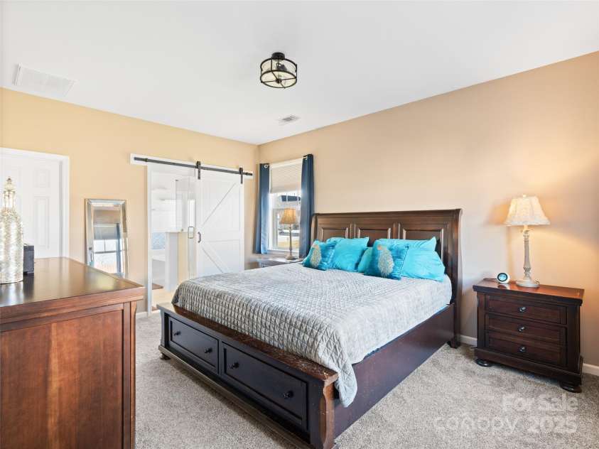 112 Pamlico Road, Fletcher, NC 28732.  MLS# CAR4215521, YatesRealty ID 14982. Large primary bedroom.
