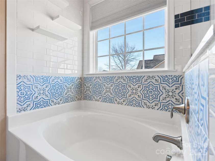 112 Pamlico Road, Fletcher, NC 28732.  MLS# CAR4215521, YatesRealty ID 14982. Large soaking tub.