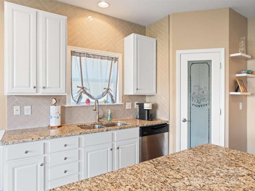 112 Pamlico Road, Fletcher, NC 28732.  MLS# CAR4215521, YatesRealty ID 14982. Lots of storage and pantry.