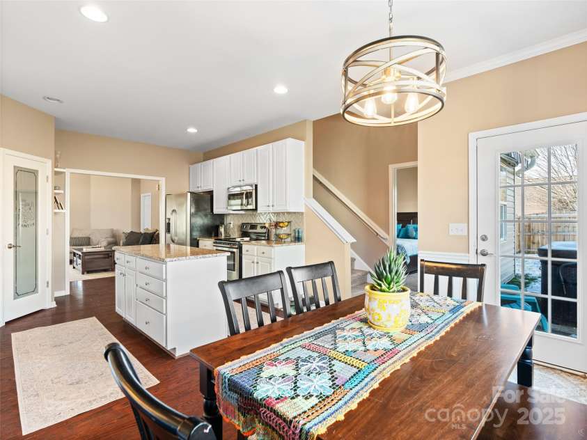 112 Pamlico Road, Fletcher, NC 28732.  MLS# CAR4215521, YatesRealty ID 14982. Open dining and kitchen.