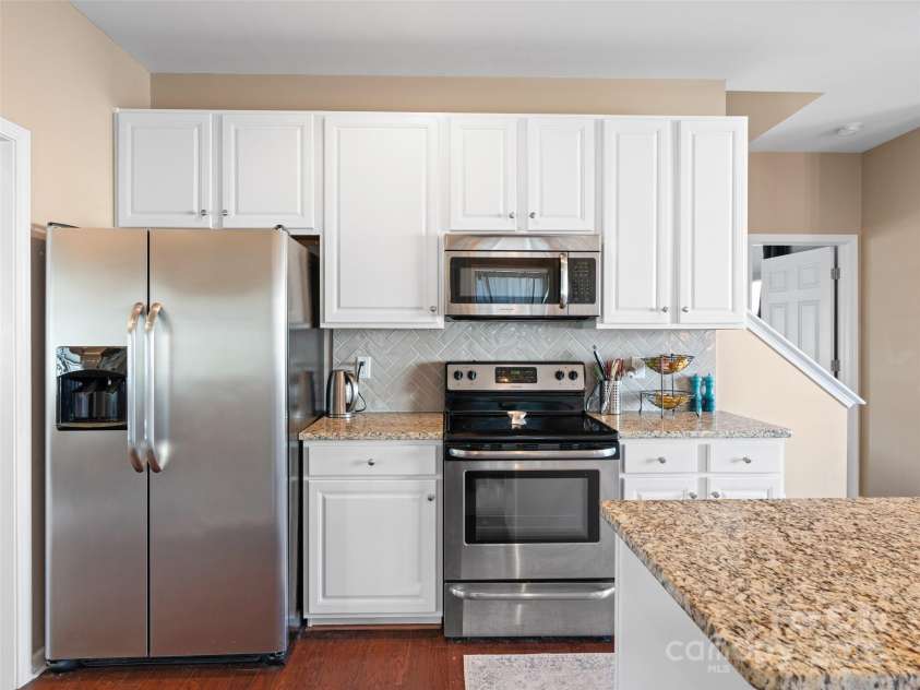112 Pamlico Road, Fletcher, NC 28732.  MLS# CAR4215521, YatesRealty ID 14982. Stainless steel appliances.
