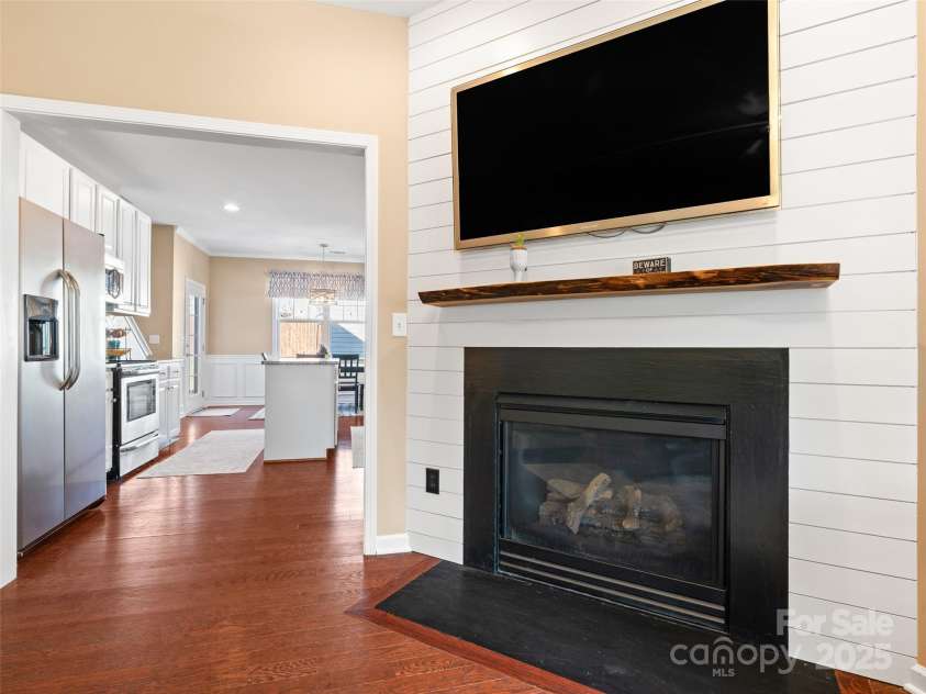 112 Pamlico Road, Fletcher, NC 28732.  MLS# CAR4215521, YatesRealty ID 14982. Walnut live edge mantle with gas fireplace.