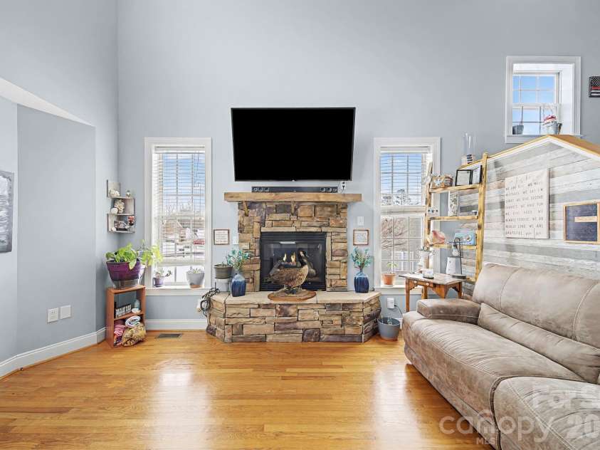 1151 Pine Cross Drive, Mount Pleasant, NC 28124.  MLS# CAR4338730, YatesRealty ID 14984. Fireplace has been improved with rock