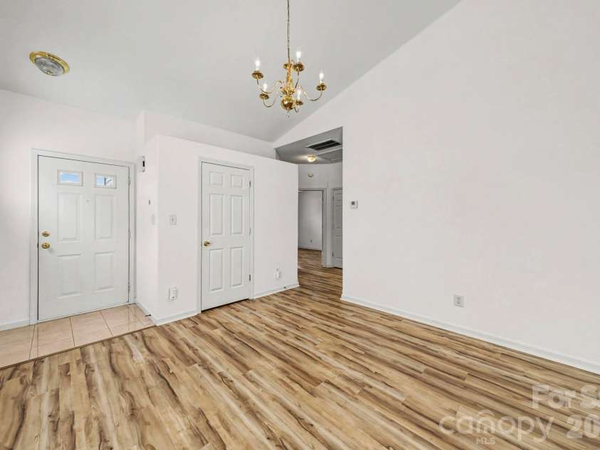 6216 Lentz Way, Harrisburg, NC 28075.  MLS# CAR4341681, YatesRealty ID 14988. Entry from front door into dining area.