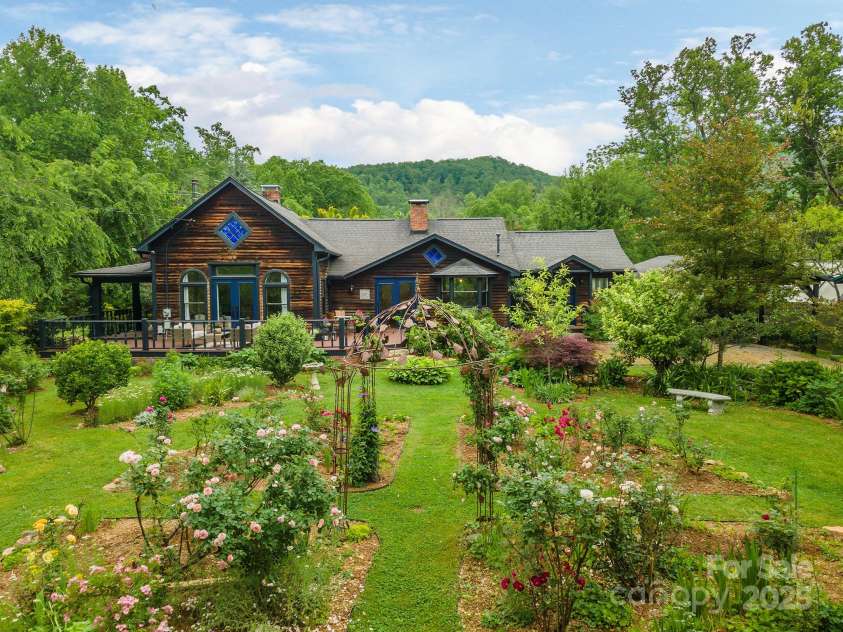 528 Padgettown Road, Black Mountain, NC 28711.  MLS# CAR4261507, YatesRealty ID 1499. Main garden with gazebo with view of Greybeard Mountain. 