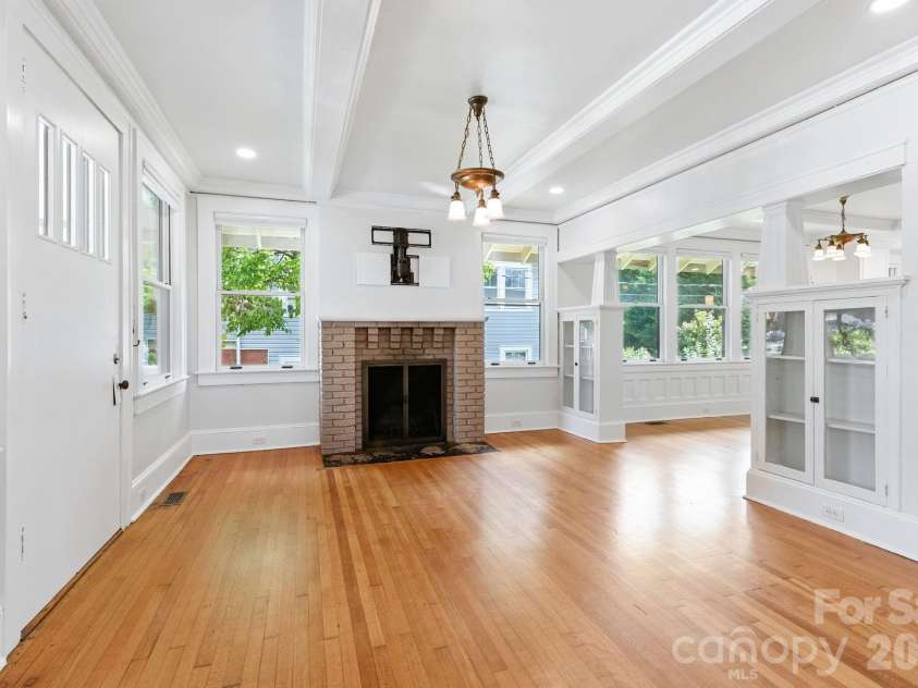 38 Austin Avenue, Asheville, NC 28801.  MLS# CAR4364938, YatesRealty ID 14994. Craftsman builtins and a working fireplace welcome you into the living room