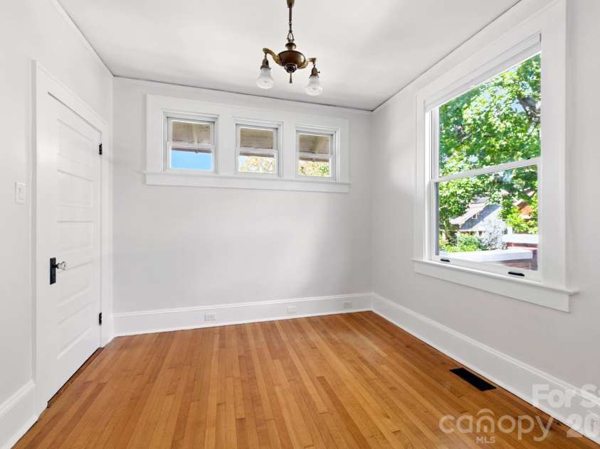 38 Austin Avenue, Asheville, NC 28801.  MLS# CAR4364938, YatesRealty ID 14994. Sunny home office or 3rd bedroom with french doors