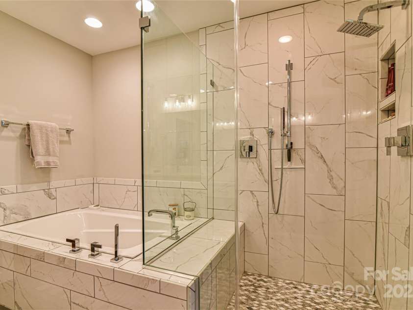 306 View Street, Black Mountain, NC 28711.  MLS# CAR4241357, YatesRealty ID 14995. Soaking Tub and Dual Faucet Walk in Shower