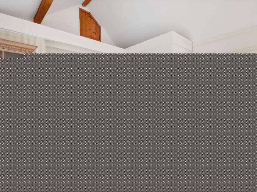 528 Padgettown Road, Black Mountain, NC 28711.  MLS# CAR4261507, YatesRealty ID 14998. Secondary Bedroom with custom wood doors, wood flooring and storage loft. 