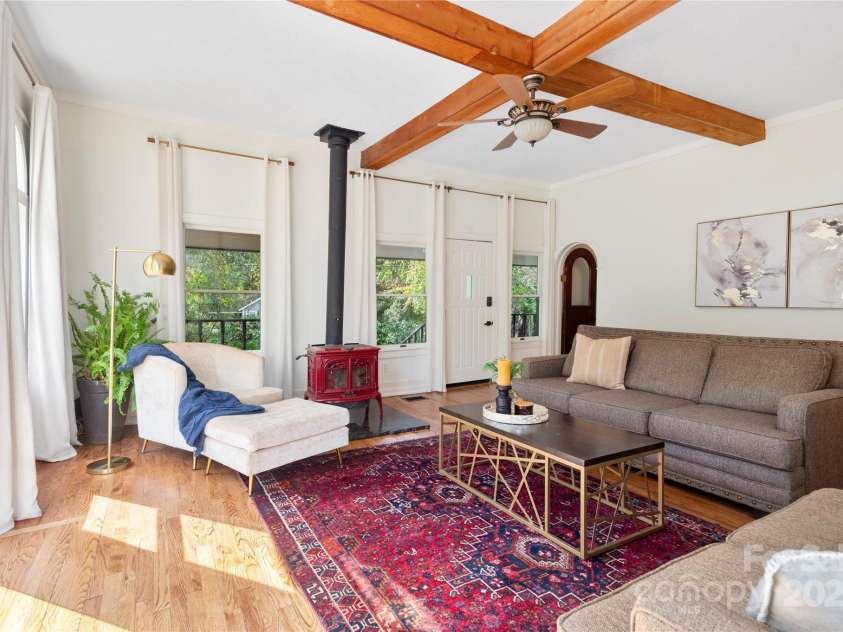 528 Padgettown Road, Black Mountain, NC 28711.  MLS# CAR4261507, YatesRealty ID 14998. Spacious light & bright with wood burning stove and recently refinished floors.