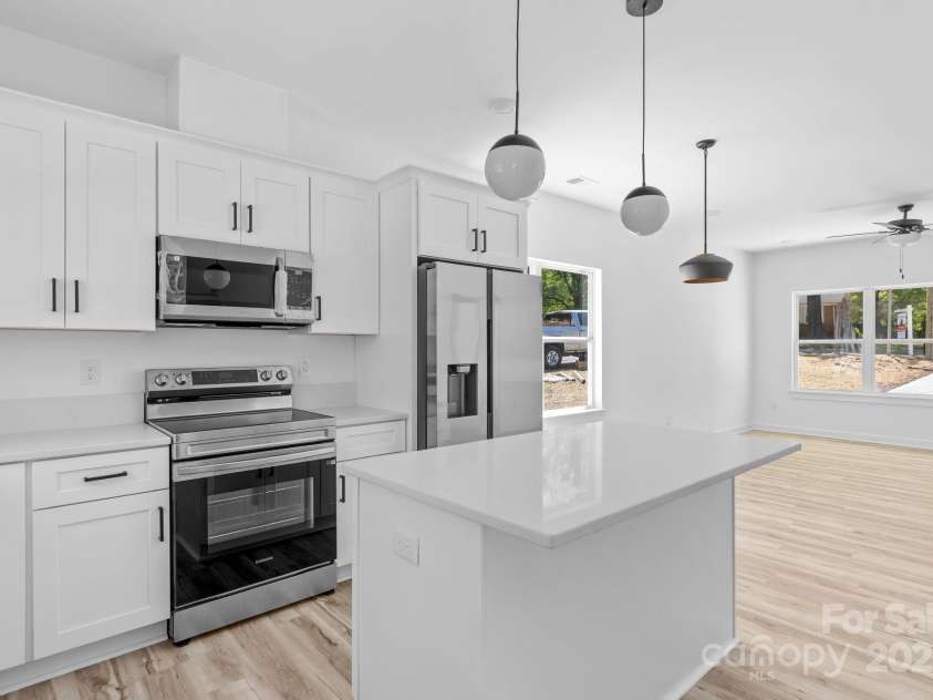 1611 Carlton Avenue, Kannapolis, NC 28083.  MLS# CAR4234812, YatesRealty ID 15002. Kitchen- Living room