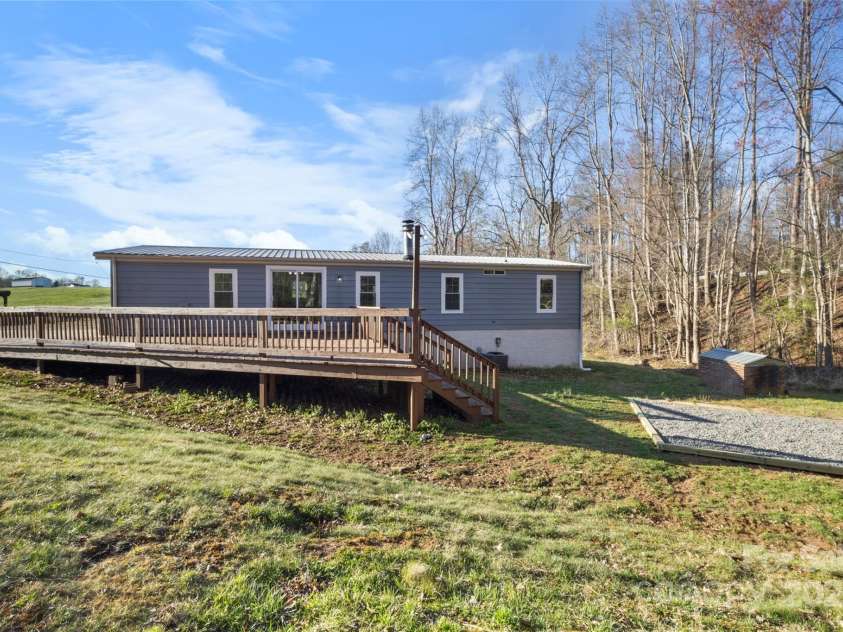 2390 Old Wilkesboro Road, Statesville, NC 28625.  MLS# CAR4240423, YatesRealty ID 15003. Large back deck for grilling and hosting.