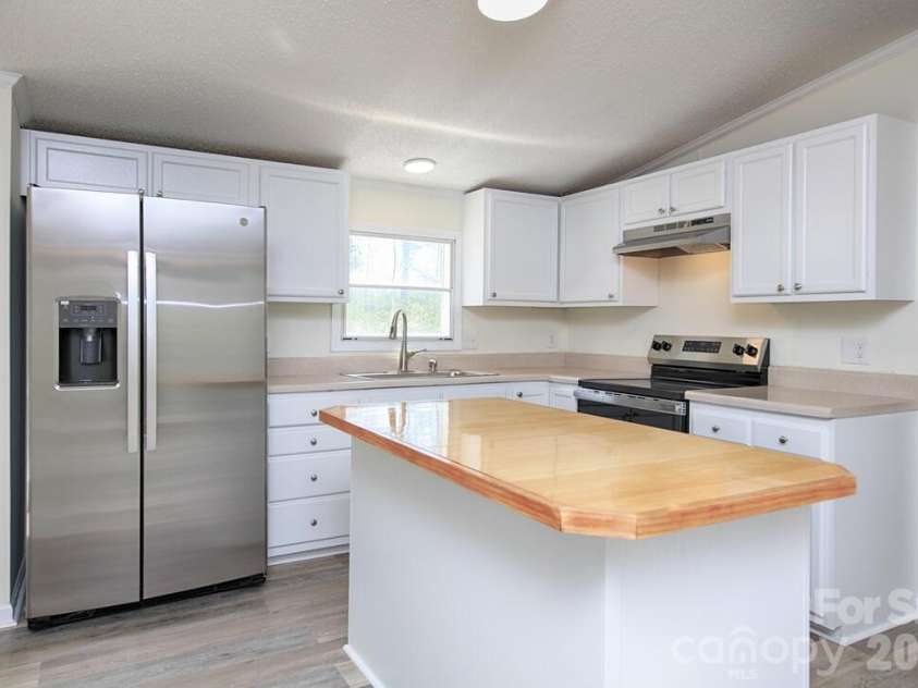 223 Ridge Creek Drive, Troutman, NC 28166.  MLS# CAR4374186, YatesRealty ID 15006. 