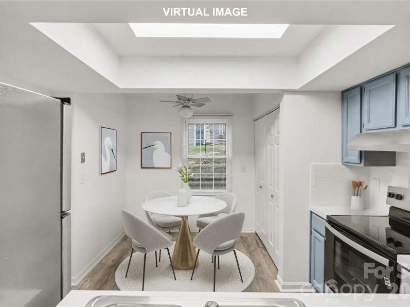 6540 Point Comfort Lane, Charlotte, NC 28226.  MLS# CAR4349728, YatesRealty ID 15015. Breakfast area in kitchen!