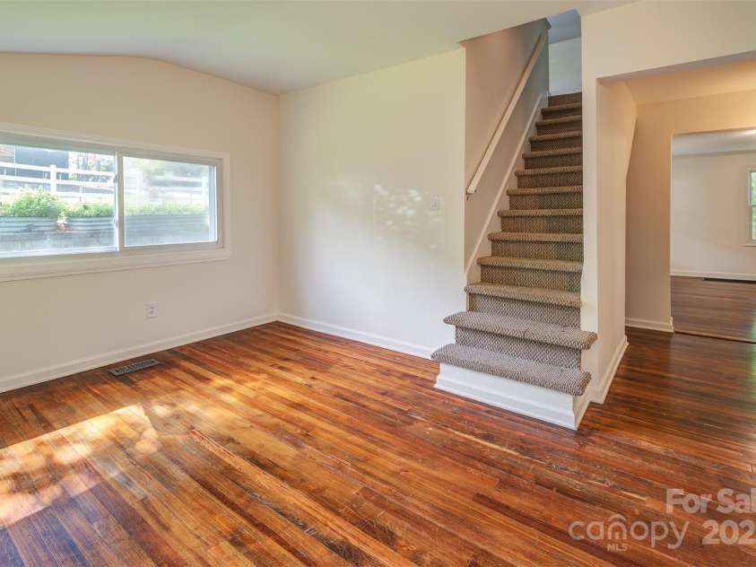 9 North Street, Weaverville, NC 28787.  MLS# CAR4255225, YatesRealty ID 15016. Den