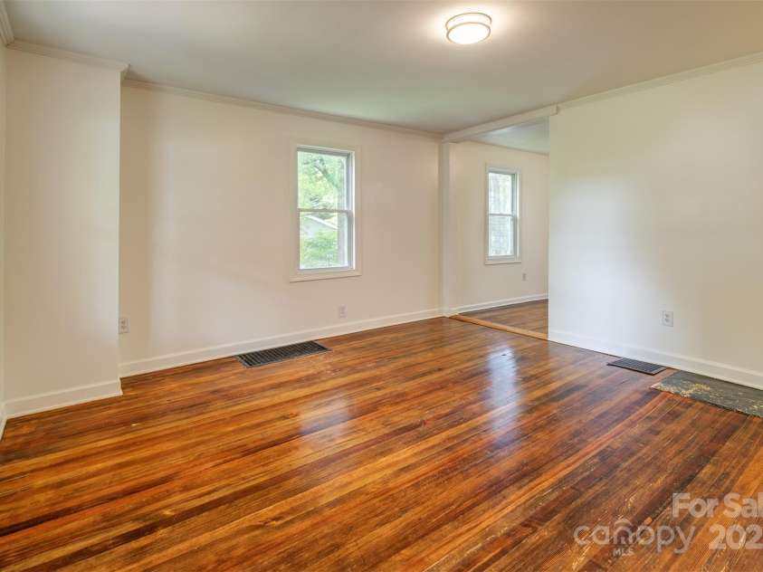 9 North Street, Weaverville, NC 28787.  MLS# CAR4255225, YatesRealty ID 15016. Living Room (as you enter)