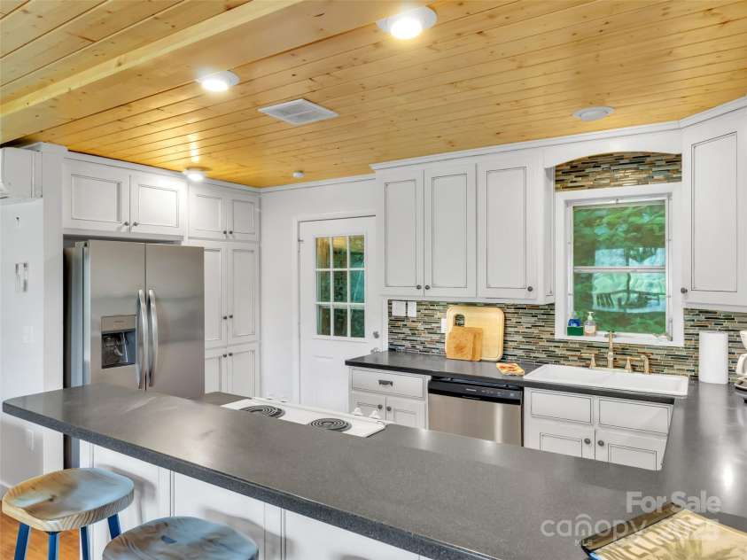 80 Hidden Falls Road, Maggie Valley, NC 28751.  MLS# CAR4259710, YatesRealty ID 15017. 