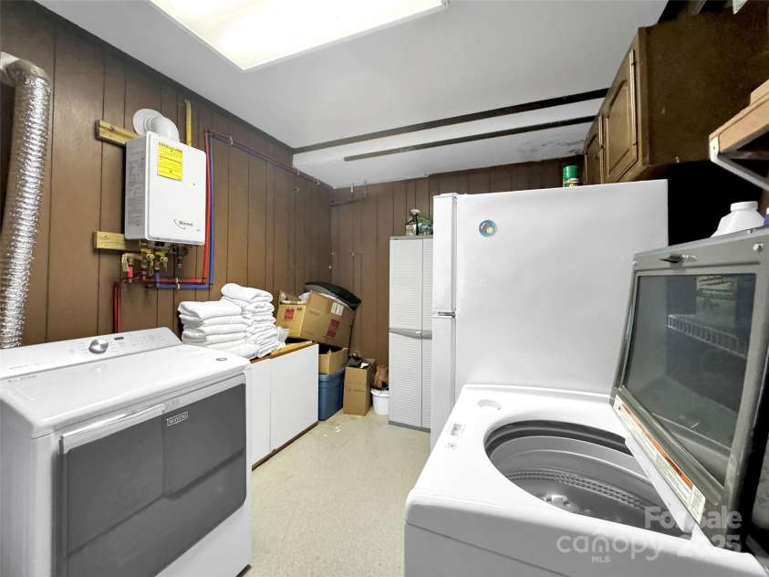 80 Hidden Falls Road, Maggie Valley, NC 28751.  MLS# CAR4259710, YatesRealty ID 15017. Basement laundry
