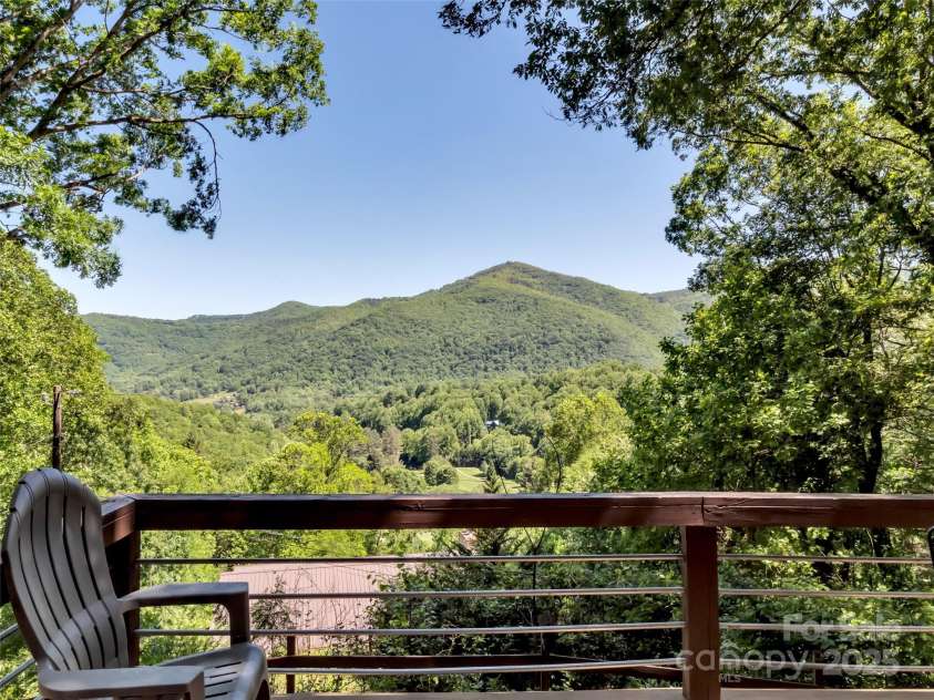 80 Hidden Falls Road, Maggie Valley, NC 28751.  MLS# CAR4259710, YatesRealty ID 15017. Beautiful deck views