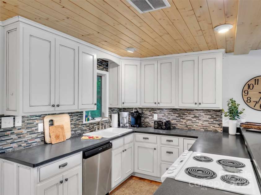 80 Hidden Falls Road, Maggie Valley, NC 28751.  MLS# CAR4259710, YatesRealty ID 15017. Updated kitchen