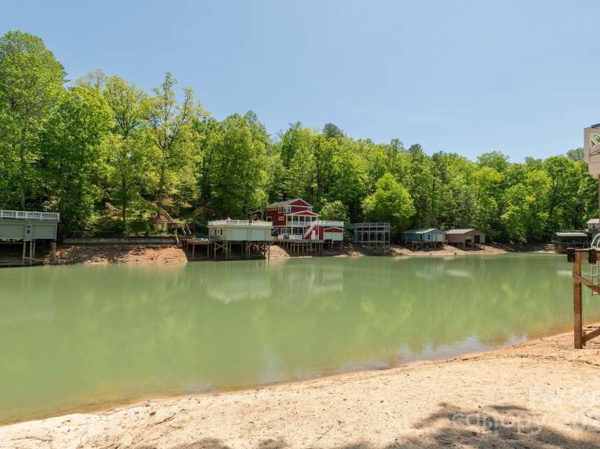 386 Charlotte Drive, Lake Lure, NC 28746.  MLS# CAR4243740, YatesRealty ID 15020. Across the cove