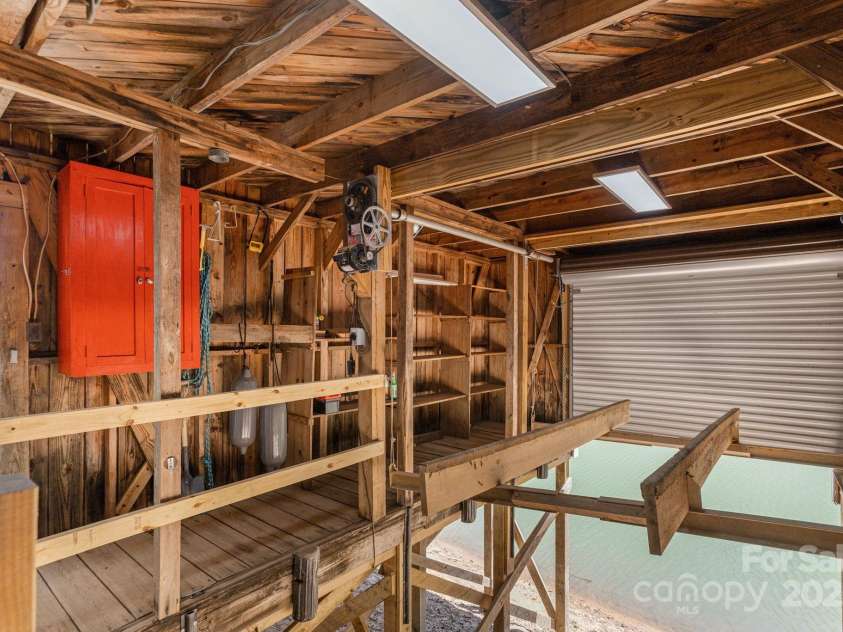 386 Charlotte Drive, Lake Lure, NC 28746.  MLS# CAR4243740, YatesRealty ID 15020. Boathouse and Lift - sturdy and solid