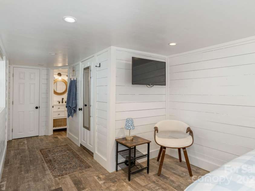 386 Charlotte Drive, Lake Lure, NC 28746.  MLS# CAR4243740, YatesRealty ID 15020. Lower Level: Laundry and en suite