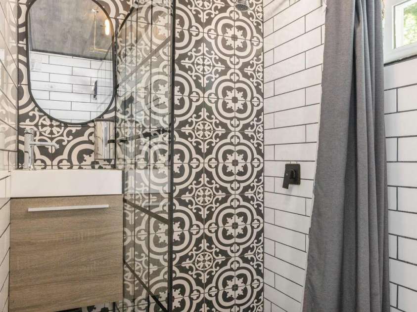 386 Charlotte Drive, Lake Lure, NC 28746.  MLS# CAR4243740, YatesRealty ID 15020. Main Level: Bathroom