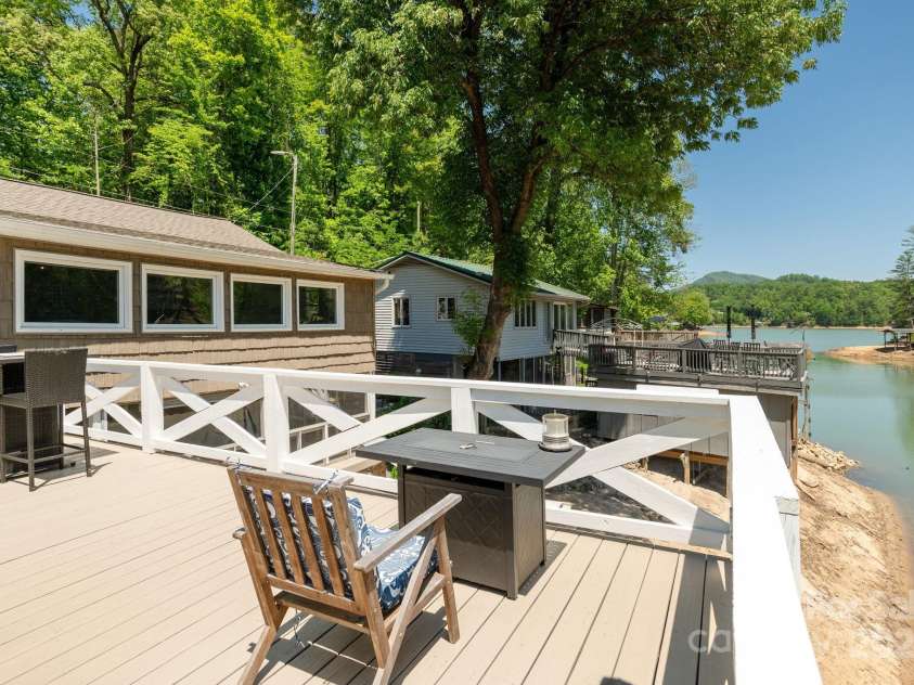 386 Charlotte Drive, Lake Lure, NC 28746.  MLS# CAR4243740, YatesRealty ID 15020. Rooftop Deck over Boathouse: Firepit