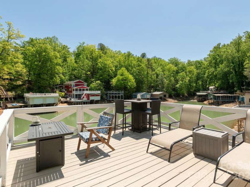 386 Charlotte Drive, Lake Lure, NC 28746.  MLS# CAR4243740, YatesRealty ID 15020. Rooftop Deck over Boathouse: Plenty of entertaining space!
