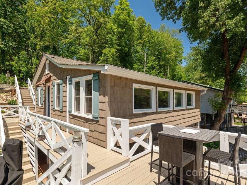 386 Charlotte Drive, Lake Lure, NC 28746.  MLS# CAR4243740, YatesRealty ID 15020. Rooftop Deck over Boathouse: View toward the home