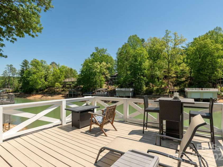386 Charlotte Drive, Lake Lure, NC 28746.  MLS# CAR4243740, YatesRealty ID 15020. Rooftop Deck over Boathouse: view toward the main lake