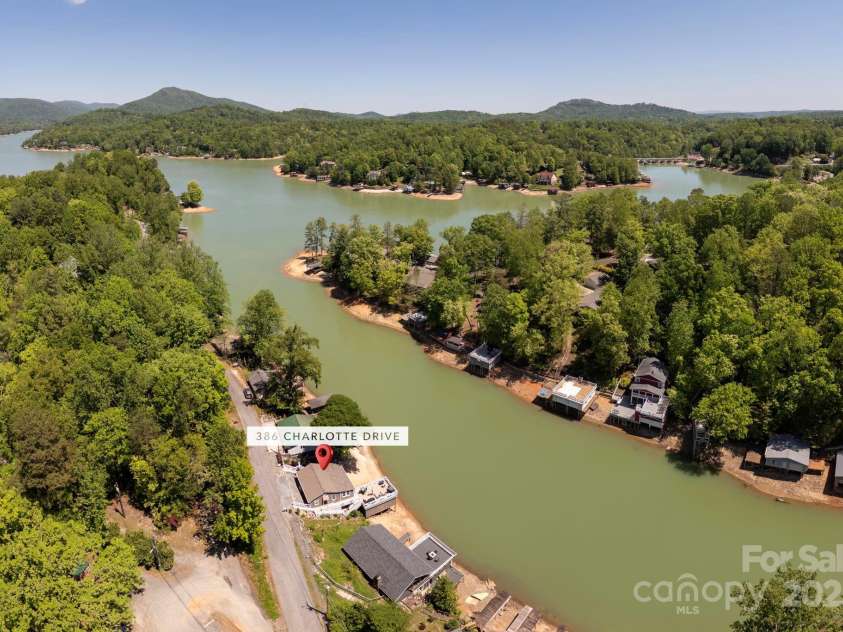 386 Charlotte Drive, Lake Lure, NC 28746.  MLS# CAR4243740, YatesRealty ID 15020. View toward the main body of the lake. Dam is on the right at @2 o'clock.