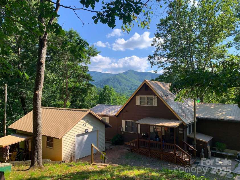 96 Winding Way, Canton, NC 28716.  MLS# CAR4248874, YatesRealty ID 15030. Photo from the Summertime with more growth